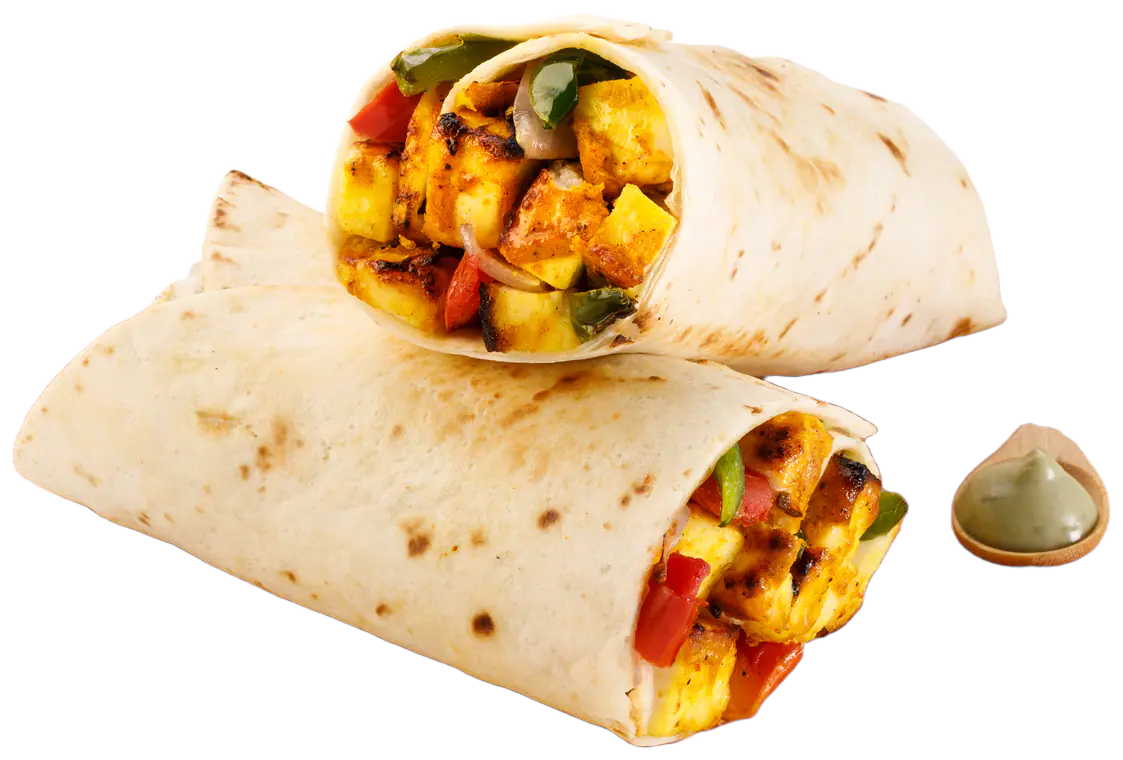 Paneer tikka roll cut in half