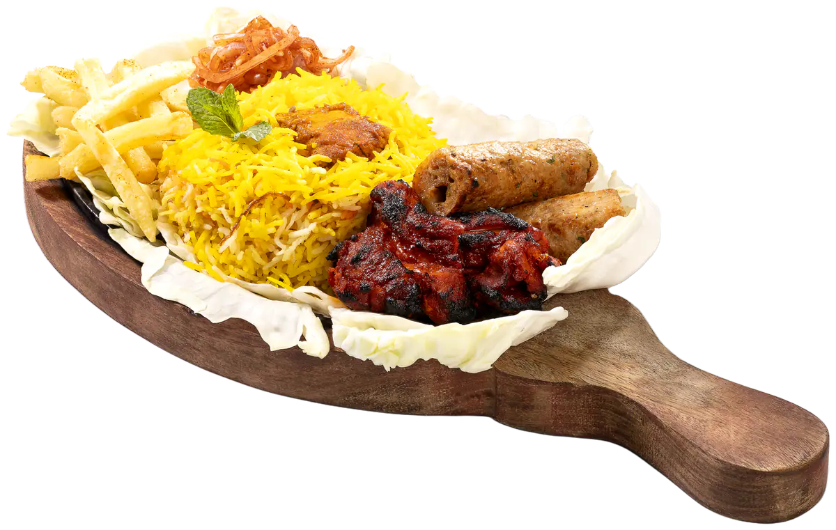 Biryani sizzler with char-grilled kebabs and fries on a wooden paddle