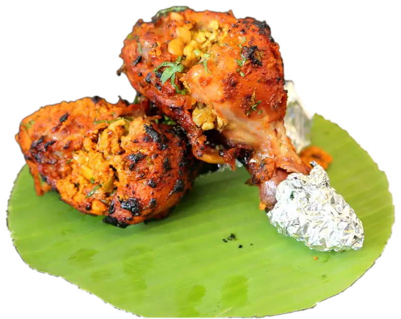 Stuffed Tangdi Kebab on a banana-leaf plate